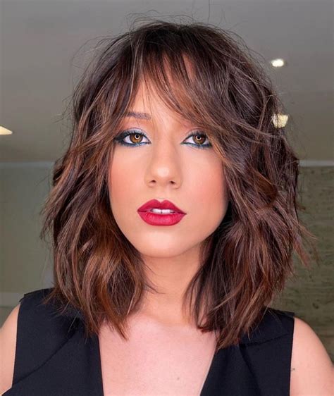 medium length hair cut with bangs